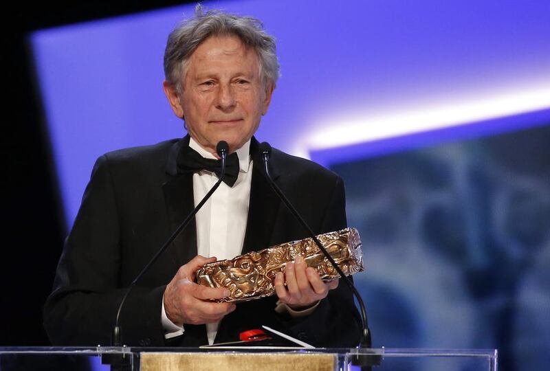 Polish-French director Roman Polanski receives the Best director award. Etienne Laurent / EPA