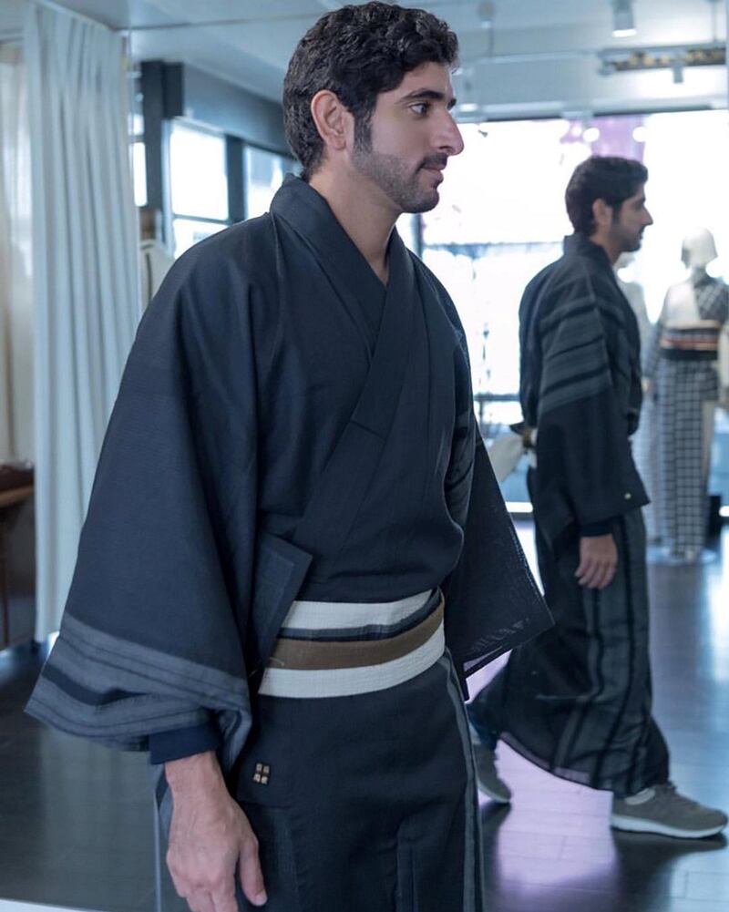 Sheikh Hamdan bin Mohammed tries on a kimono during a visit to Japan. Sheikh Hamdan/Twitter