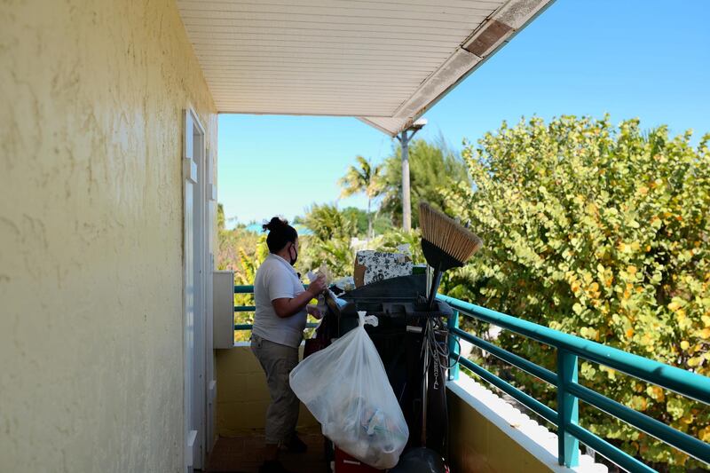 A worker prepares to clean a room at the ‘Tween Waters Island Resort and Spa hotel in Captiva Island, Florida, Florida, U.S., on Friday, April 2, 2021. A resurgent job market is creating more opportunities at a faster clip than many economists and employers expected. What's more, too few people are applying for positions that are reopening, and that's setting up a battle for talent. Photographer: Lisette Morales/Bloomberg