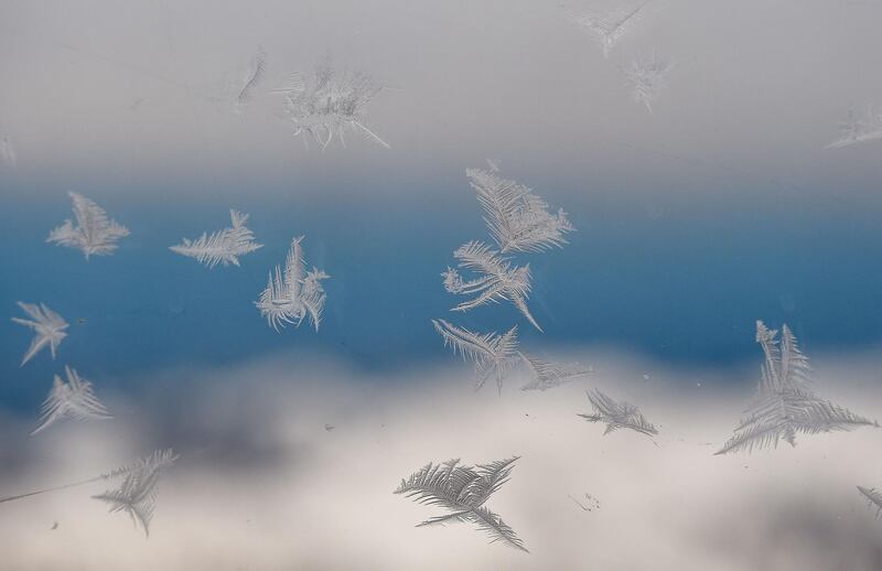 Frost flowers are seen on a window of the summit station at the Zugspitze mountain in Germany. AFP