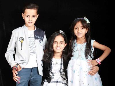 From left, Tawfiq Al Mansouri’s children Thair, 11, Tawakkul, 13, and Nouran, nine. Photo: Abdullah Al Mansouri