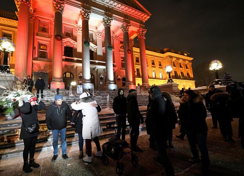 A candlelight vigil held at the Edmonton Legislature building in memory of the victims of a Ukrainian passenger plane that crashed in Iran.  Reuters