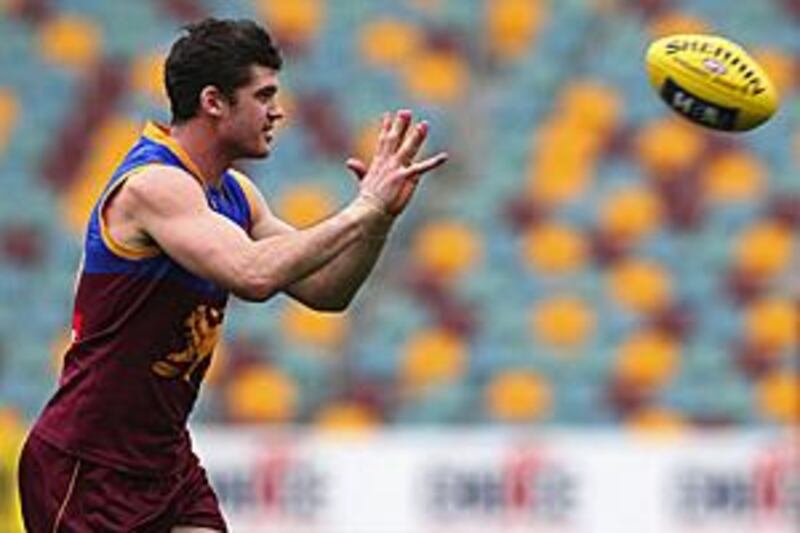 The imposing Brisbane forward Jonathan Brown kicked in four goals as the Lions led at every break and tamed the second-placed Cats in the 15th round by 43 points.