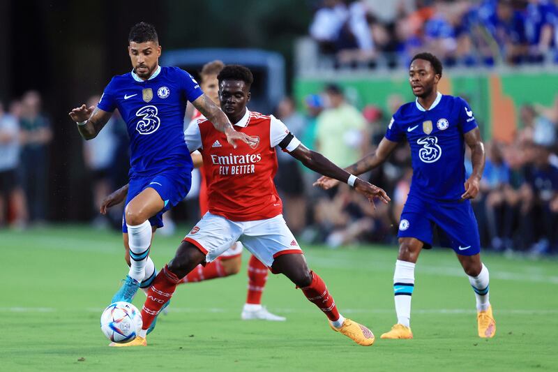 Chelsea full-back Emerson battles for possession with Arsenal winger Bukayo Saka. Getty
