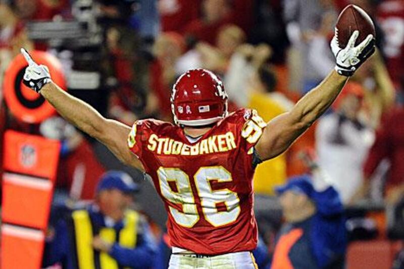 Andy Studebaker, the Chiefs linebacker, celebrates recovering a Philip Rivers fumble with less than a minute remaining in the game. Kansas would beat San Diego in overtime.