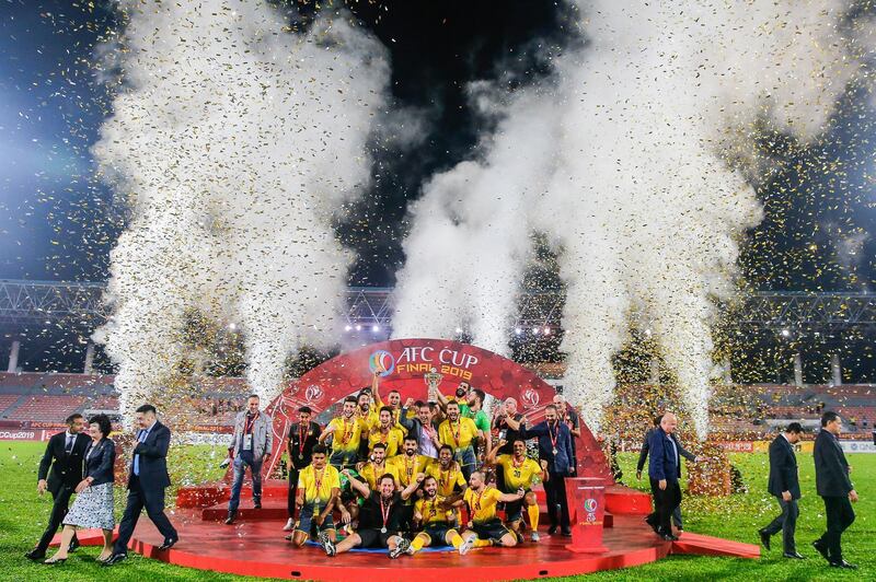 Al Ahed of Lebanon enjoy the trophy presentation after winning the AFC Cup Fina with a 1-0 win over their North Korean opponents in Kuala Lumpur. EPA