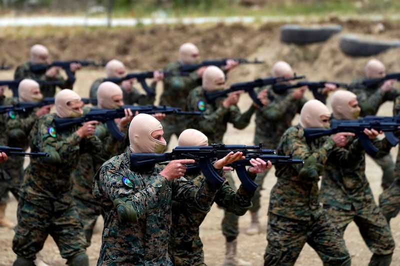 Hezbollah fighters training in southern Lebanon's Jezzine district in in May 2023.  AP Photo