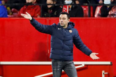 FC Barcelona's head coach Xavi Hernandez reacts during the Spanish LaLiga soccer match between Sevilla FC and FC Barcelona held at Sanchez Pizjuan Stadium, in Seville, southern Spain, 21 December 2021.   EPA / Jose Manuel Vidal