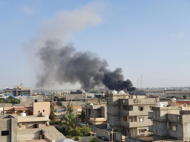 Smoke billows following a reported airstrike by forces loyal to retired general Khalifa Haftar on Tajoura, south of the Libyan capital.  AFP