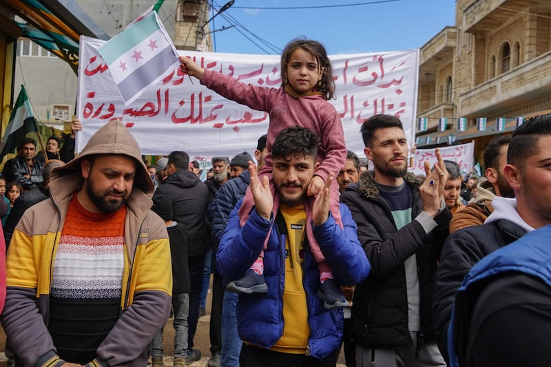 Syrians demonstrate in Binnish, in Idlib province, on the 13th anniversary of the country's revolution as they demand the departure of President Bashar Al Assad and Abu Muhammad Al Jolani, the leader of Hayat Tahrir Al Sham. All photos: Moawia Atrash for the National