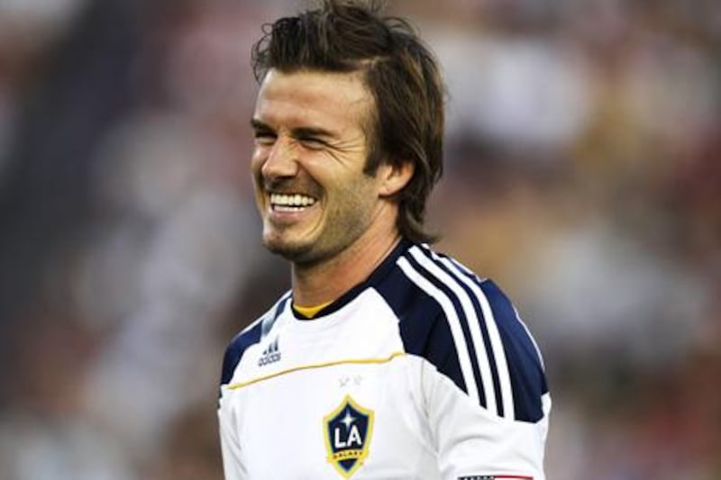 David Beckham of LA Galaxy gestures during an exhibition football match against the Newcastle Jets at Energy Australia Stadium in Newcastle on November 27, 2010. Global superstar David Beckham and world cup US hero Landon Donovan drew a crowd of over 23,000 fans. IMAGE STRICTLY RESTRICTED TO EDITORIAL USE Ð STRICTLY NO COMMERCIAL USE  AFP PHOTO / KRYSTLE WRIGHT