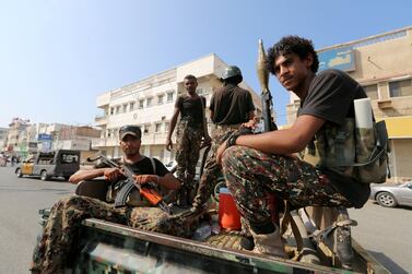 Houthi fighters patrol a street in Hodeidah. Reuters