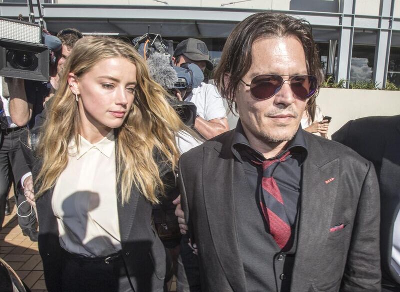 US actor Johnny Depp and his now estranged wife Amber Heard leave a court in Southport on Australia’s Gold Coast on April 18, 2016. Glenn Hunt / EPA