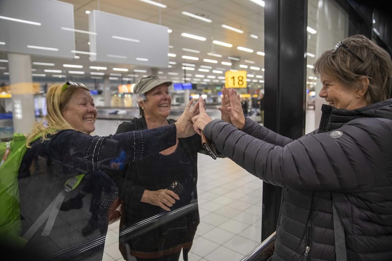 Dutch passengers from the Westerdam cruise ship arrive home.  EPA