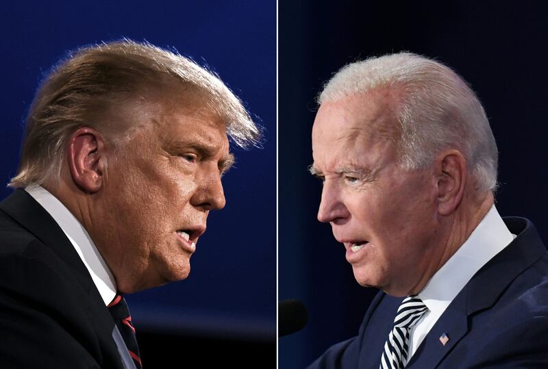 President Joe Biden, right, trails Donald Trump on issues including the economy, the poll has found. AFP