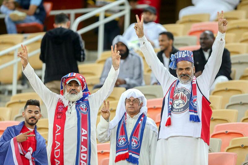 Supporters of Al-Adalah cheer during the Saudi Professional League soccer match between Al-Ittihad Club and Al-Adalah FC at King Abdullah Sport City Stadium in Jeddah, Saudi Arabia.  EPA