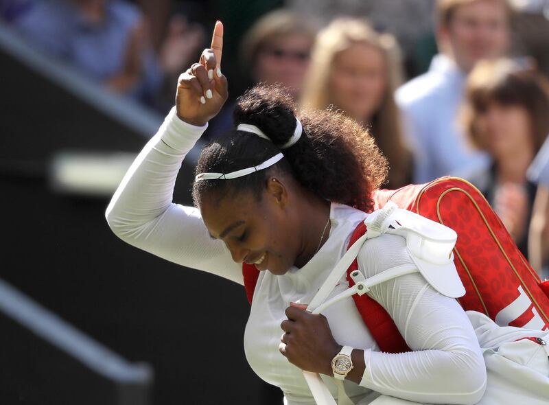 Serena Williams of the United States celebrates winning her women's singles quarterfinals match against Italy's Camila Giorgi, at the Wimbledon Tennis Championships, in London, Tuesday July 10, 2018. (AP Photo/Kirsty Wigglesworth)