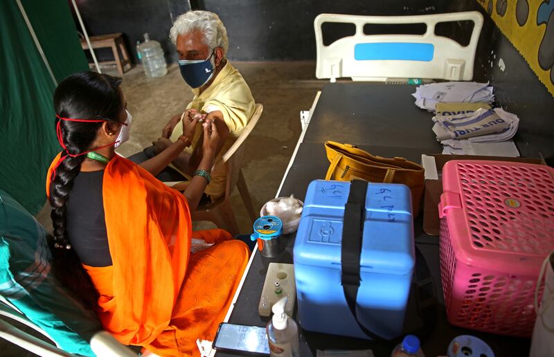 A man receives a vaccine shot against Covid-19 in Bangalore, India.