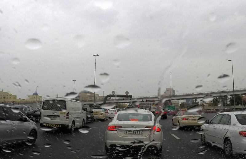 DUBAI , UNITED ARAB EMIRATES , March 17 – 2019 :- Traffic during the rain in Karama area in Dubai. ( Pawan Singh / The National ) For News. 