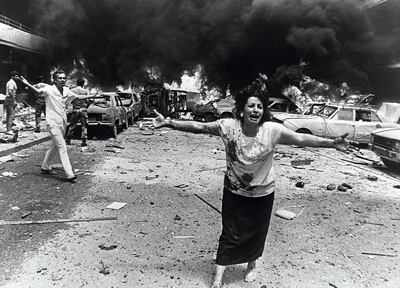 A woman cries in shock, minutes after a car bomb exploded in a crowded neighborhood of mainly-Moslem West Beirut 08 August 1986, killing 13 people, including three children, and injuring at least 92. The Lebanese civil war broke out 20 years ago in April 1975. AFP PHOTO KHALIL DEHAINI (Photo by KHALIL DEHAINI / AFP)