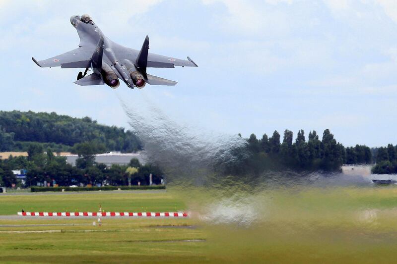 A Sukhoi Su-35 fighter takes off during a flying display, two days before the Paris Air Show, at the Le Bourget airport near Paris, June 15, 2013. The Paris Air Show runs from June 17 to 23. REUTERS/Pascal Rossignol (FRANCE - Tags: BUSINESS  AIR TRANSPORT DEFENCE)