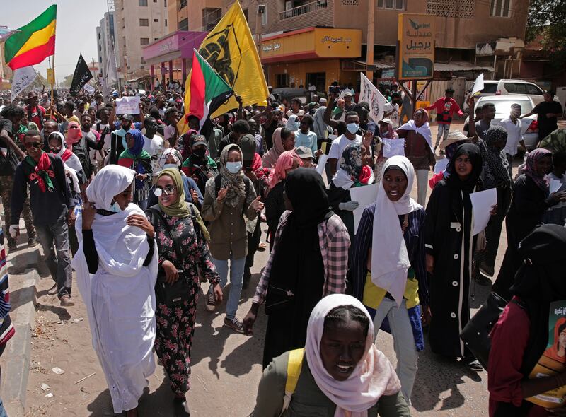 Sudanese anti-coup protesters take part in ongoing demonstrations. AP