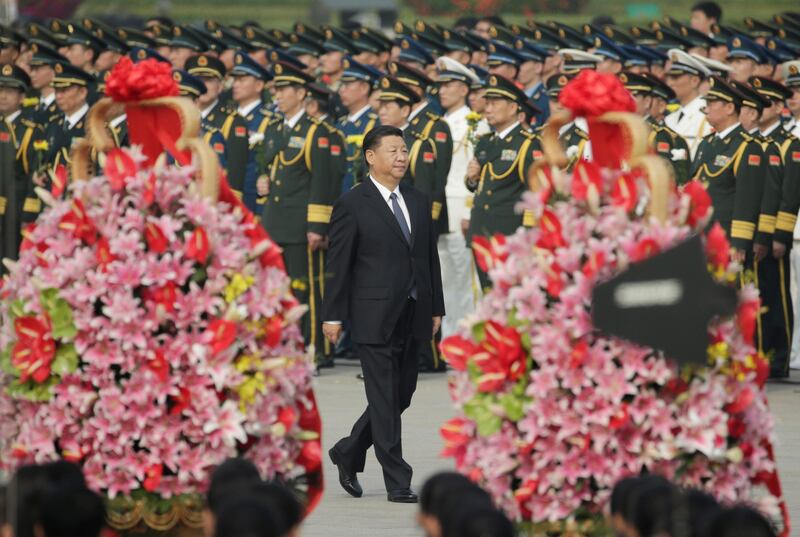 Chinese President Xi Jinping arrives to attend a tribute ceremony in front of the Monument to the People's Heroes at Tiananmen Square, ahead of National Day marking the 68th anniversary of the founding of the People's Republic of China in Beijing, China, September 30, 2017. REUTERS/Jason Lee
