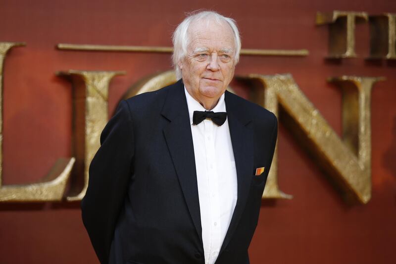 British author and songwriter Tim Rice poses on the red carpet upon arriving for the European premiere of the film The Lion King in London on July 14, 2019. (Photo by Tolga AKMEN / AFP)