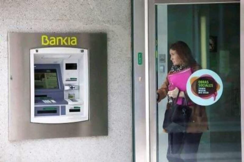 Bankia shares fell almost 10 per cent yesterday after reports in newspapers that Spaniards withdrew €1 billion in the past few days. Angel Navarrete / Bloomberg News