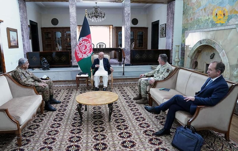 Afghanistan's President Ashraf Ghani meets with Pakistan's Army Chief of Staff General Qamar Javed Bajwa, in Kabul, Afghanistan May 10, 2021. Presidential Palace/Handout via REUTERS THIS IMAGE HAS BEEN SUPPLIED BY A THIRD PARTY. NO RESALES. NO ARCHIVES