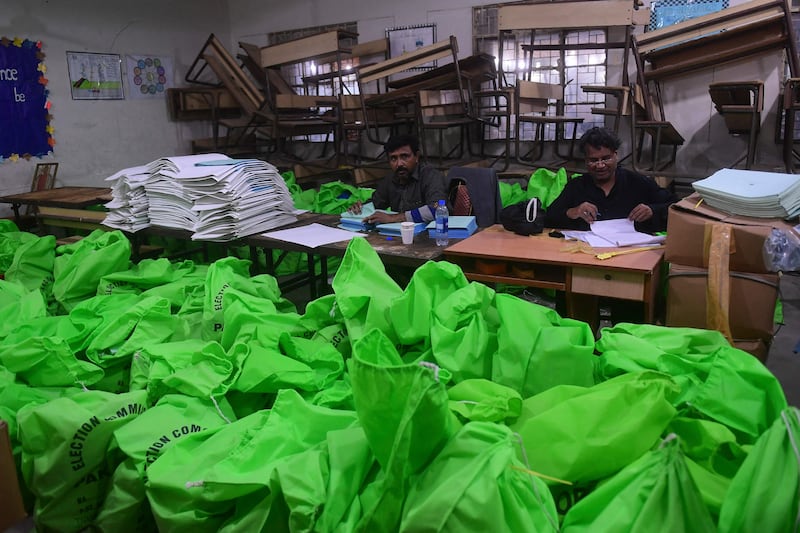 Pakistani election commission workers set up a distribution centre for voting in Karachi, in the lead up to Thursday's national vote. AFP