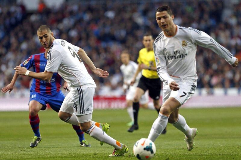 Cristiano Ronaldo scored Real Madrid's first goal on Sunday and assisted on their second. Kiko Huesca / EPA / March 9, 2014