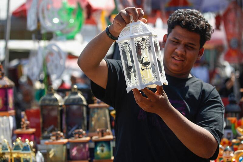 An Iraqi man sells traditional lanterns at the Shorja market in central Baghdad. AFP