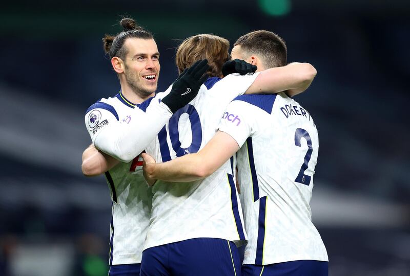 Harry Kane celebrates with Gareth Bale and Matt Doherty after the third. Getty