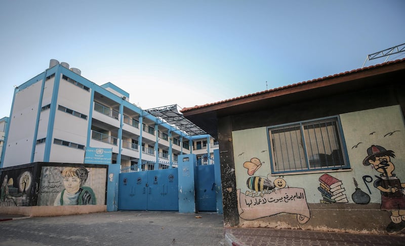 The closed gate of the United Nations Relief and Works Agency school in Gaza city. The Palestinian government in Ramallah announced a one-month emergency in response to fears of the spread of Covid-19.  EPA