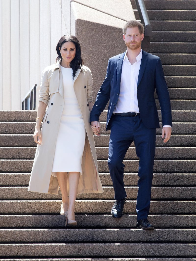 SYDNEY, AUSTRALIA - OCTOBER 16: Prince Harry, Duke of Sussex and Meghan, Duchess of Sussex meet and greet the public at the Sydney Opera House on October 16, 2018 in Sydney, Australia. The Duke and Duchess of Sussex are on their official 16-day Autumn tour visiting cities in Australia, Fiji, Tonga and New Zealand. (Photo by Paul Edwards - Pool/Getty Images)