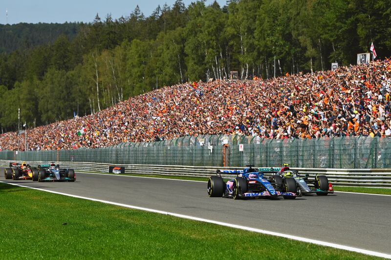 Fernando Alonso driving the Alpine F1 A522 Renault and Lewis Hamilton of Great Britain driving the (44) Mercedes AMG Petronas battle for track position up the Kemmel straight. Getty Images