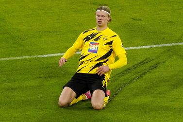 Borussia Dortmund's Erling Haaland celebrates scoring against Bayern Munich. Reuters