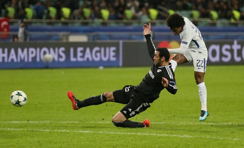 Willian scores Chelsea's fourth goal. Aziz Karimov / Reuters