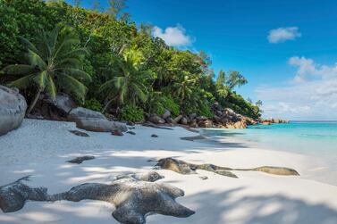 Granite rocks and untouched bays make Praslin Island one of the world's most coveted beach destinations. Courtesy Constance Lemuria