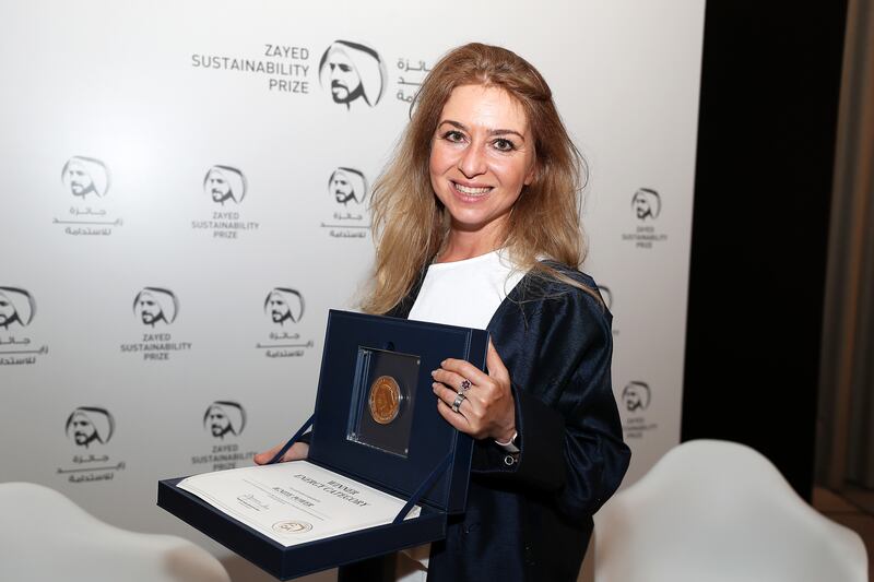 Angela Homsi from Ignite Power, the winner of Zayed Sustainability Energy Category award after the presentation ceremony at the Expo City Dubai.  Pawan Singh / The National 