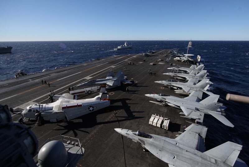Aircraft are lined up on 'USS Harry S Truman' in the Adriatic Sea. The Truman strike group is operating under Nato command and control along with several other Nato allies for co-ordinated maritime manoeuvres, anti-submarine warfare training and long-range training. Reuters