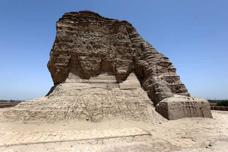 The ziggurat at the archaeological site of Aqar Quf, or Dur Kurigalzu, at Abu Ghraib town, 30 km western Baghdad, Iraq, 13 June 2023.  The ziggurat at Aqar Quf, standing to a height of about 52 meters, was a temple for the god Enlil, the master of the air for the Kassite, and is currently an archaeological site of the ancient city of Dur Kurigalzu (or the Fortress of Kurigalzu).  After being founded by the Kassite King Kurigalzu I in the 14th century BC, the city was controlled by the Assyrians and Elamites several times before being destroyed by the Syrians in the middle of the 11th century BC.   EPA / AHMED JALIL