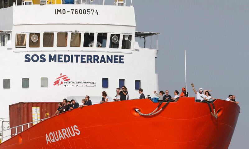 epa07214581 (FILE) - Crew members of the search and rescue vessel 'Aquarius' of NGO 'SOS Mediterranee' wave from the ship's bow as the vessel arrives in the port of Marseille, France, 29 June 2018 (reissued 07 December 2018). According to media reports on 07 December 2018, Doctors Without Borders (MSF) has been forced to end migrant rescue operations in the Mediterranean with the vessel, blaming sustained attacks on search and rescue by European states.  EPA/GUILLAUME HORCAJUELO *** Local Caption *** 54649020