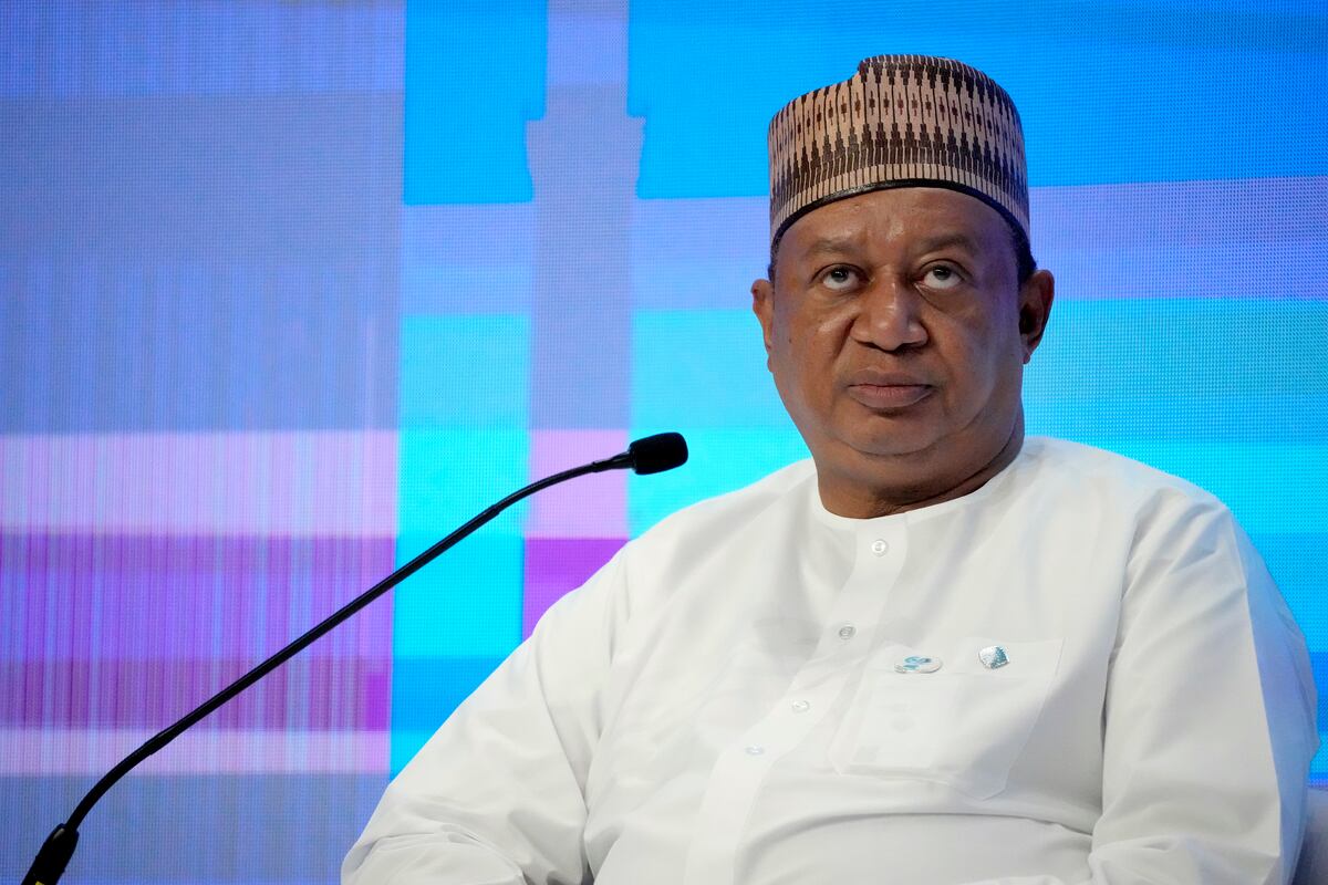 FILE - OPEC Secretary-General Mohammad Sanusi Barkindo speaks during the Atlantic Council's Global Energy Forum at the Dubai Expo 2020, in Dubai, United Arab Emirates, Monday, March 28, 2022.  The panel stressed the need for more investments in oil and gas even as countries around the world pledge to reduce emissions to bring down rising global temperatures and avert potentially irreversible damage to the Earth.  (AP Photo / Ebrahim Noroozi, File)