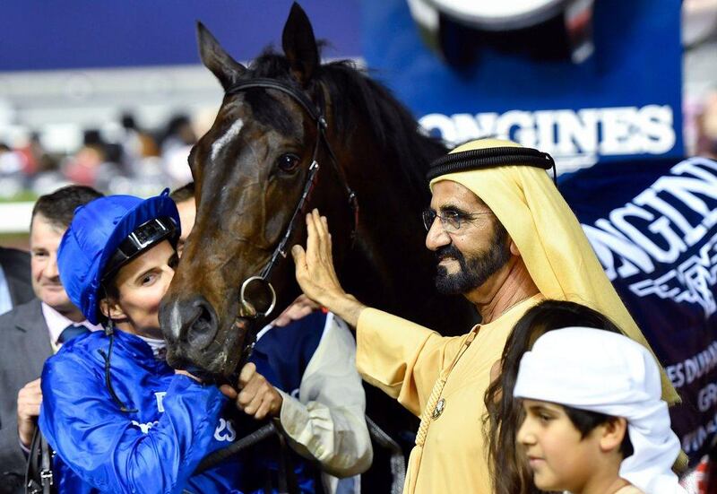Sheikh Mohammed bin Rashid with jockey William Buick, left, and horse Jack Hobbs after the Dubai Sheema Classic at the 2017 Dubai World Cup weekend at Meydan. AFP