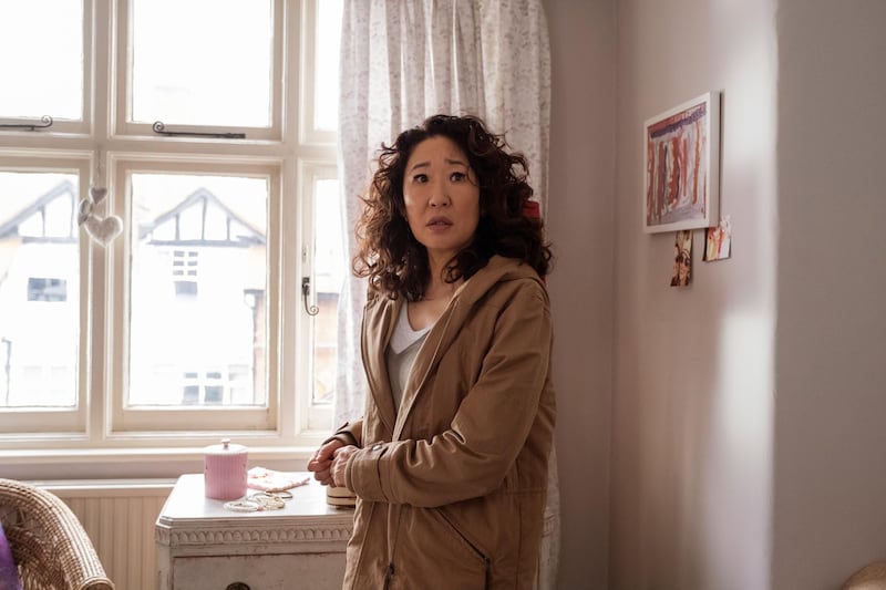 This image released by BBC America shows Sandra Oh in a scene from "Killing Eve:"  Oh is nominated for an Emmy Award for outstanding lead actress in a drama series. (Nick Wall/BBCAmerica via AP)