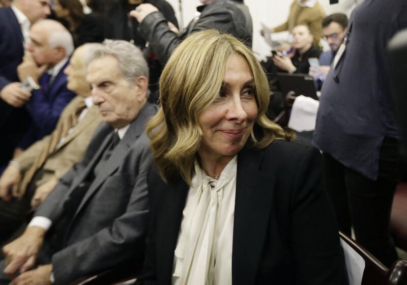 Carole, the wife of former Renault-Nissan boss Carlos Ghosn, looks emotional during a press conference in which her husband addressed a large crowd of journalists on his reasons for dodging trial in Japan, where he is accused of financial misconduct, at the Lebanese Press Syndicate in Beirut on January 8, 2020. - The 65-year-old fugitive auto tycoon vowed to clear his name as he made his first public appearance at a news conference in Beirut since skipping bail in Japan. Carlos Ghosn, who denies any wrongdoing, fled charges of financial misconduct including allegedly under-reporting his compensation to the tune of $85 million. (Photo by JOSEPH EID / AFP)