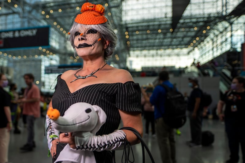 An attendee dressed as a character from 'The Nightmare Before Christmas' poses during New York Comic Con. Charles Sykes / Invision / AP
