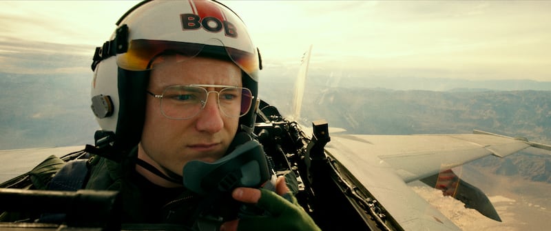 Lewis Pullman as pilot-in-training Bob.